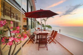 Two-Story Beachfront Oasis
